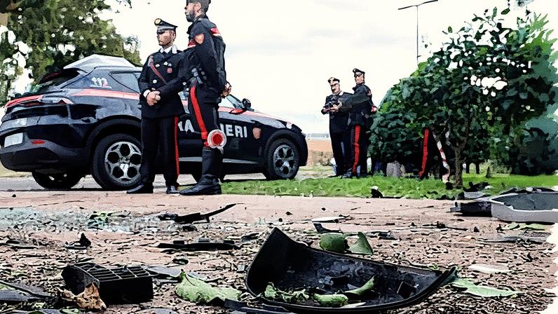 Car parts strewn on the ground at the scene. Photograph: Cecilia Fabiano/AP